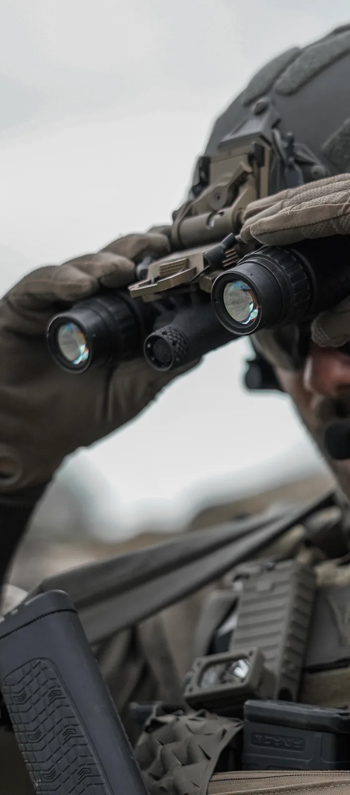 LNVM monocular held in the hand in the field, objective forward